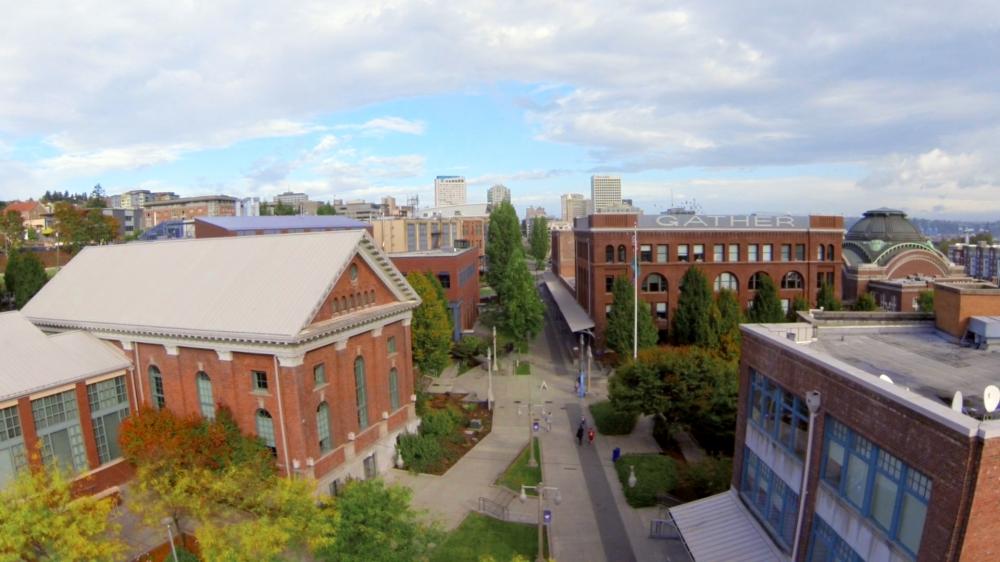 Aerial view of UW Tacoma campus, showing multiple rehabilitated historic warehouses on campus 