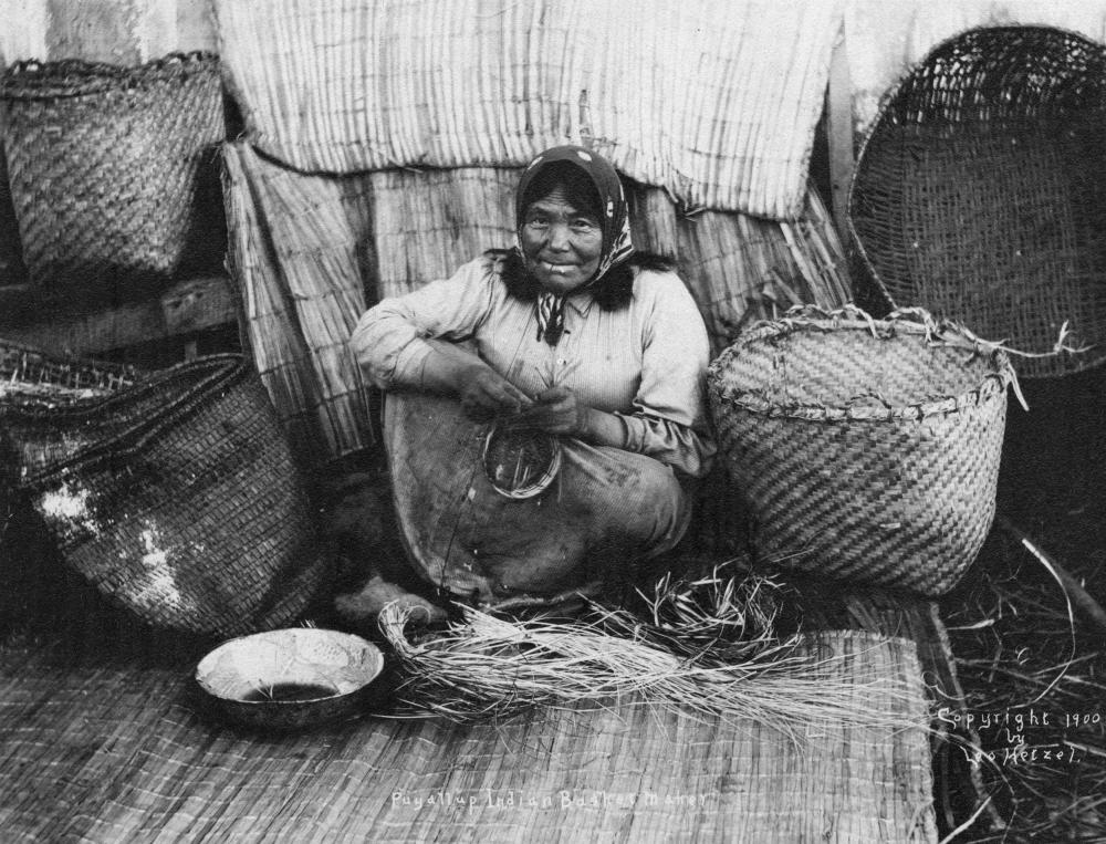 Photo of Puyallup woman weaving baskets, Washington, 1900. Courtesy University of Washington Libraries, Special Collections, NA 4102.